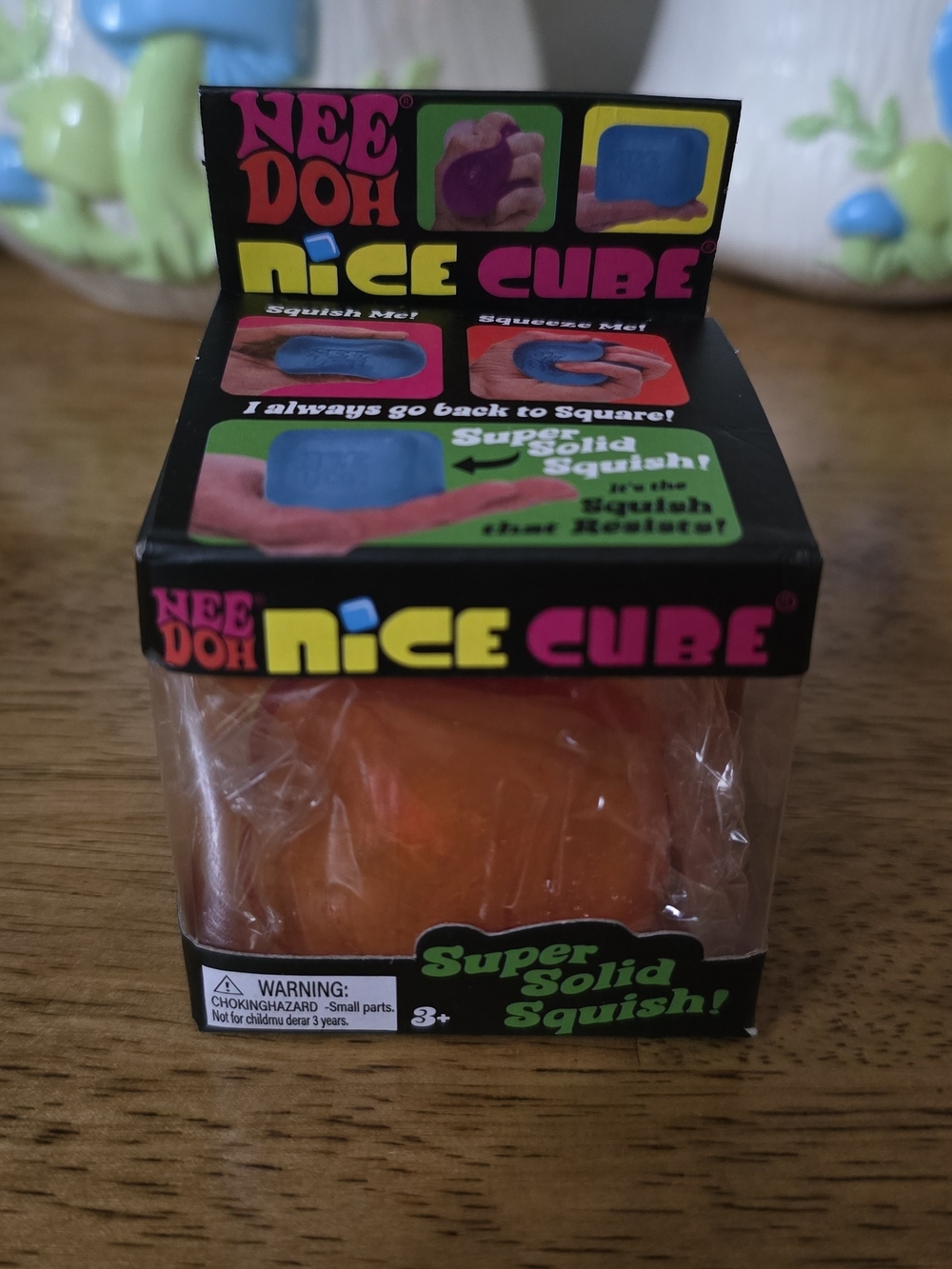 0Nee Doh Nice Cube Super Solid Squish - Orange/Yellow Swirl